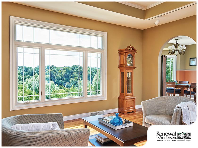 Living Room With Multiple Doors And Windows